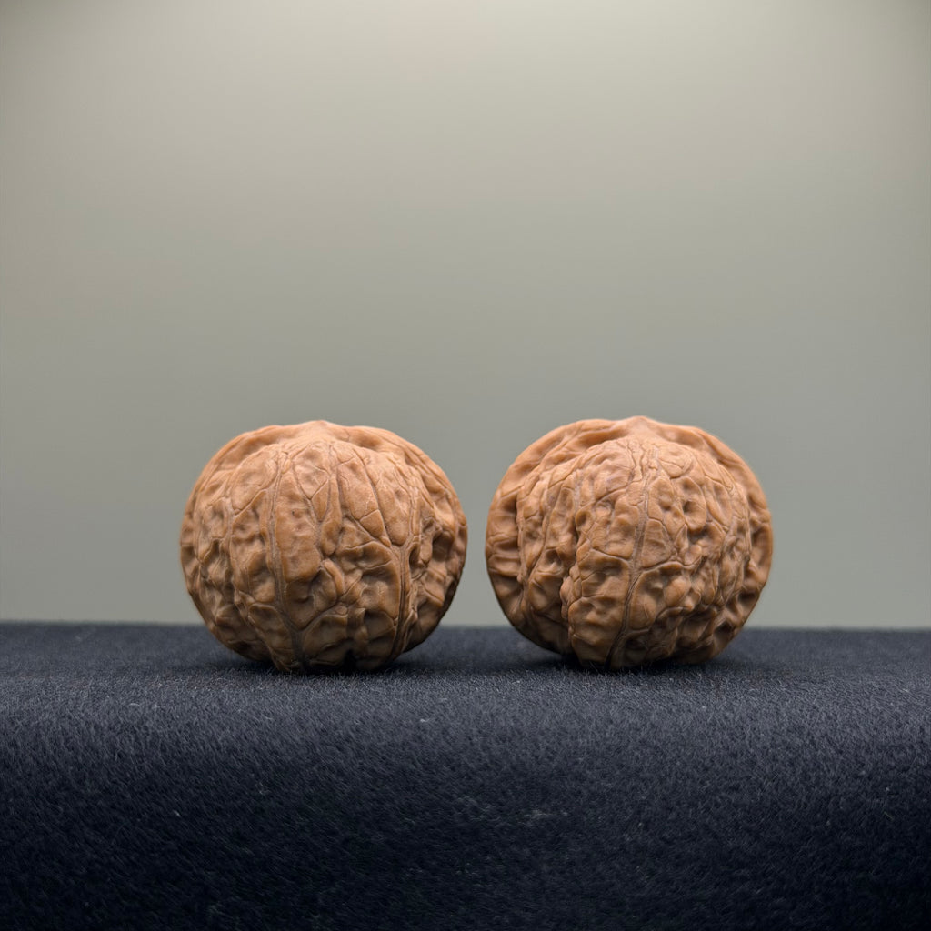 Qianlong Millstone Wenwan Walnut · 34mm · Natural · Select Ritual